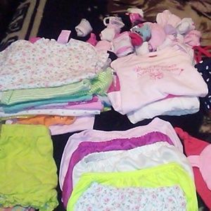 Over 50 pieces in baby girl clothes 0-10months